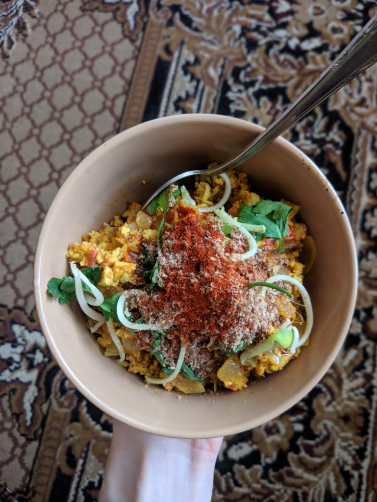 I made scrambled eggs from tofu, tomatoes, coconut milk, onions, sprouts, curry and other spices