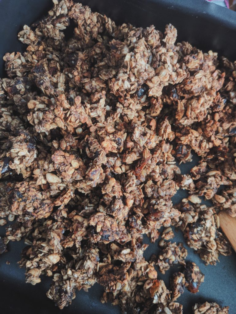 Homemade granola with dried fruits, seeds and banana