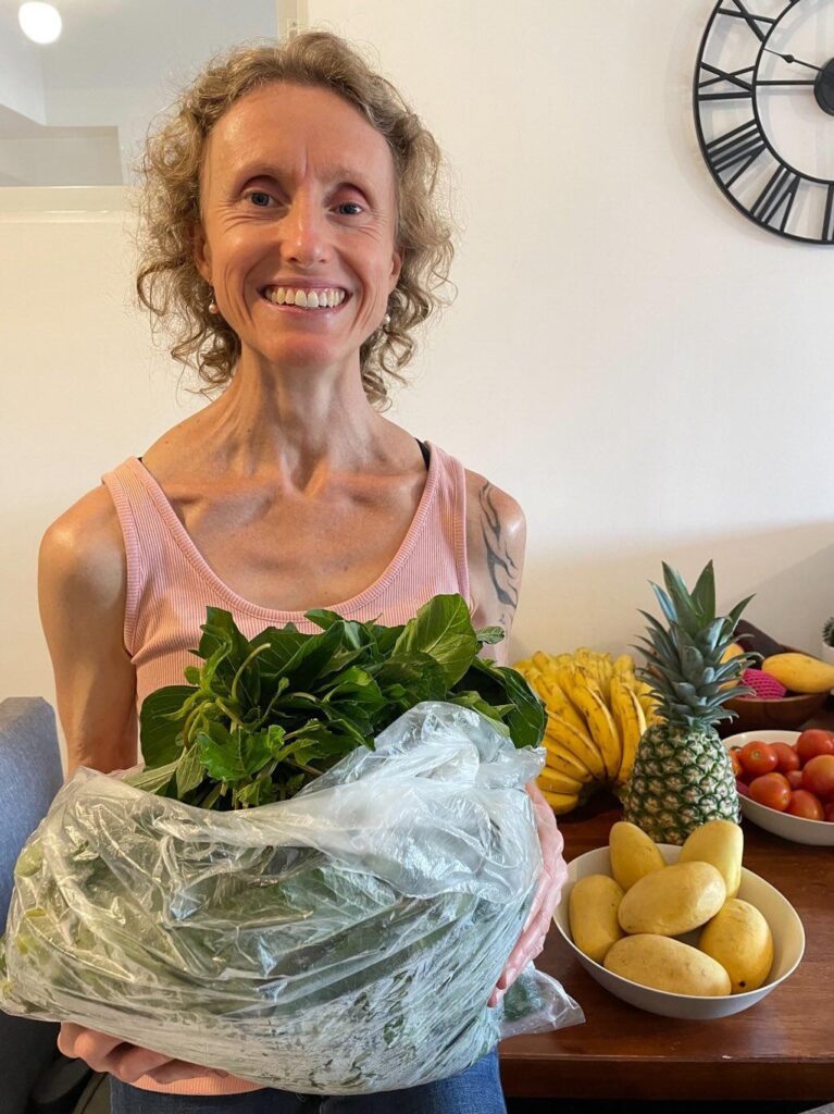 Me with some delicious organic greens that our very good friends grow locally and we enjoy when ever they harvest: Leanne Hill | Raw Vegan