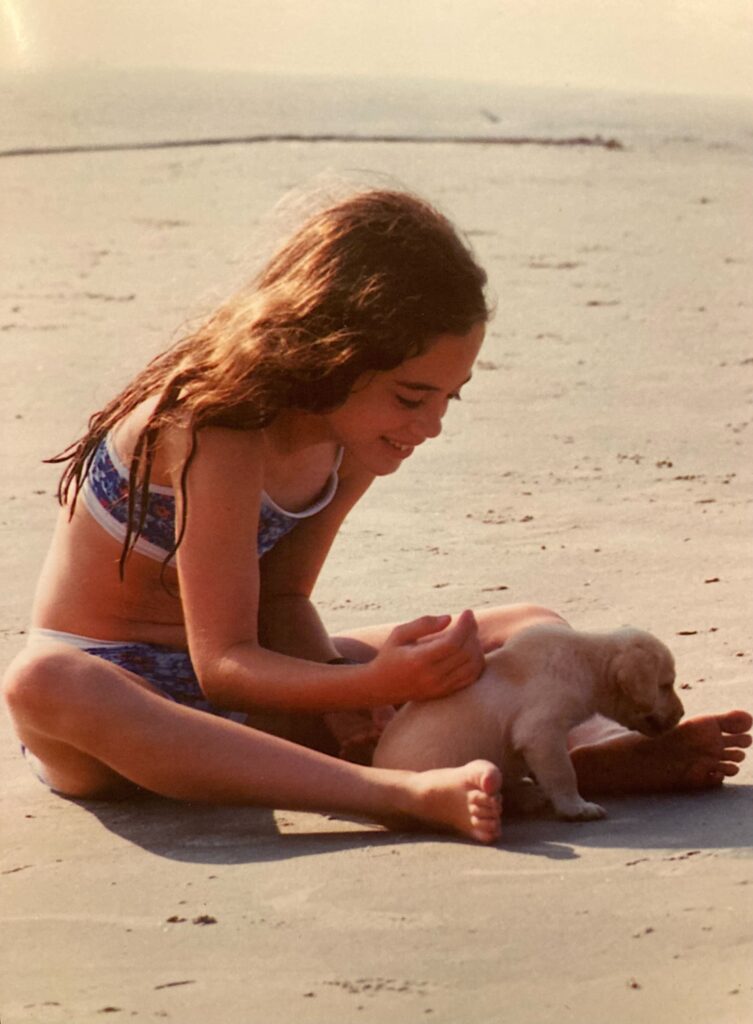 Young me adoring a puppy - Morgan Donnelly
