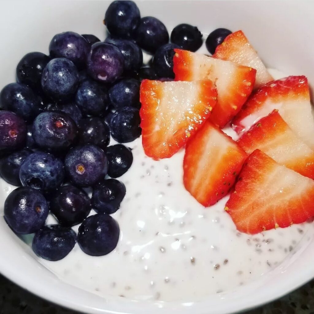 plant based yogurt with Chia seeds blueberries and strawberries