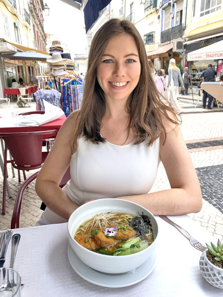 Deanna Troy Travels - Deanna with vegan ramen in Lisbon, Portugal